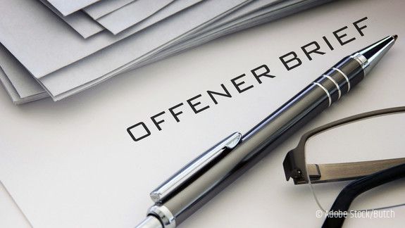 Schriftzug Offener Brief mit Kugelschreiber